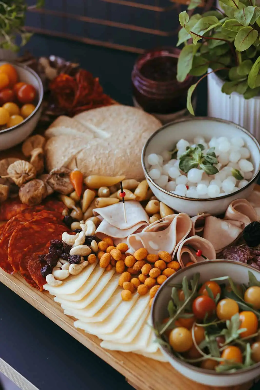 Charcuterie and gourmet appetizers served at a catering event by Catering Majetic