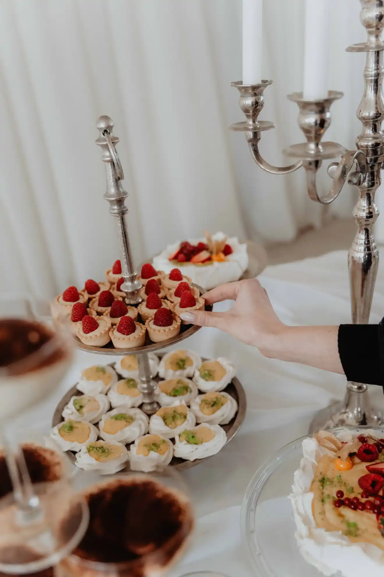 Gourmet mini tartlets and dessert display being served at a luxury wedding banquet by Catering Majetic in Croatia.